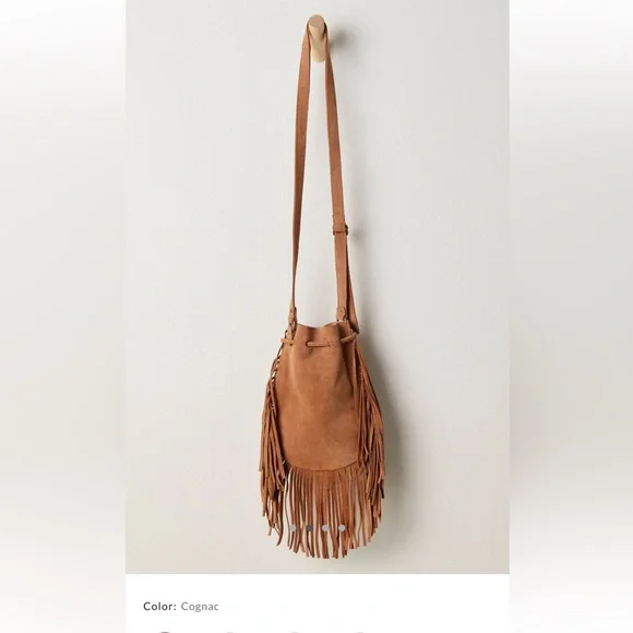 Free People Calamity crossbody Tan Fringe Shoulder Bag
Never used. 
Super cute 🌸 - Picture 2 of 5